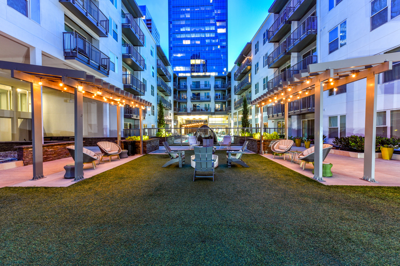 Courtyard with shaded sitting area, tables and chairs