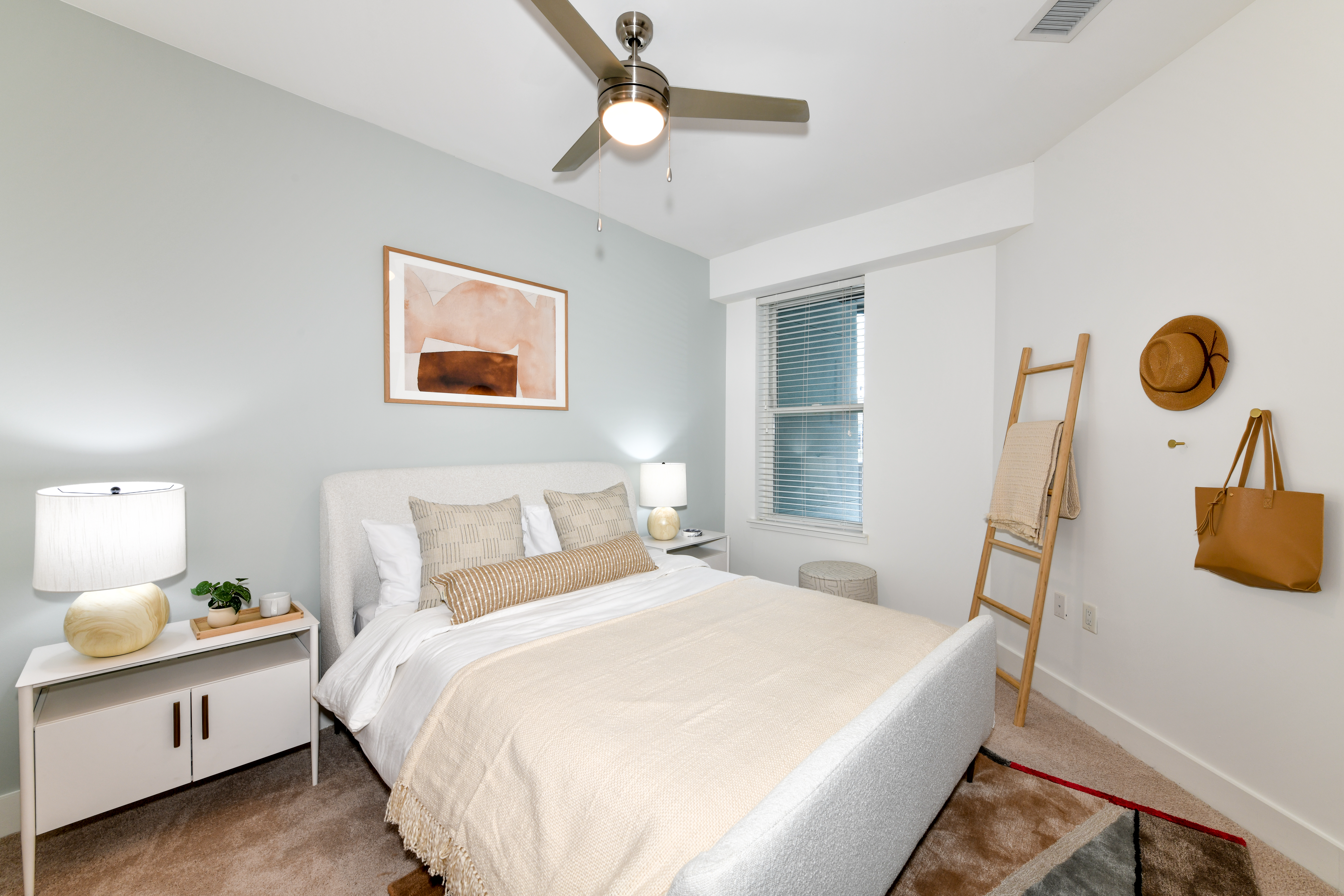 Staged Bedroom with ceiling fan and window